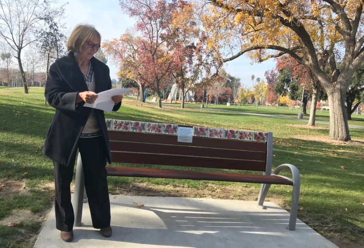 English Professor Dr. Magda Gilewicz at the bench dedication