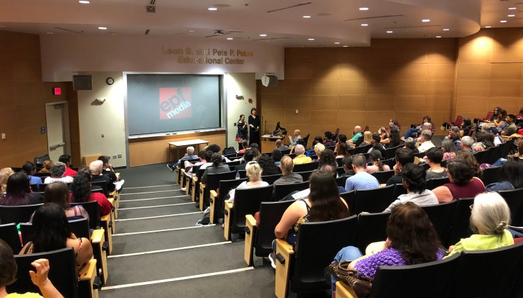 From left, Ana Cruz Navarro, director of the film “The Suffragists” (Las Sufragistas), is introduced by Mary Husain at a recent CineCulture screening.
