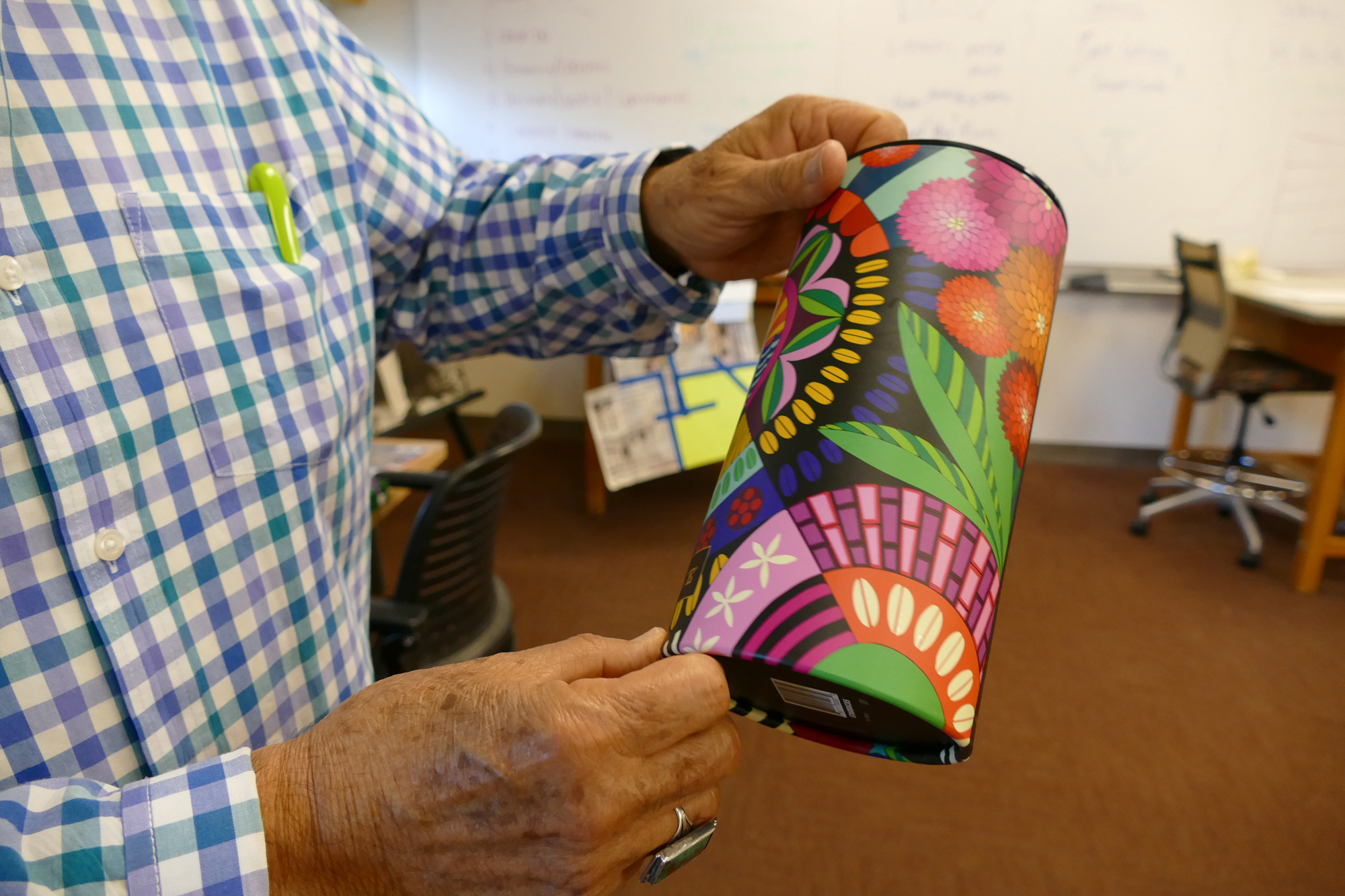 Starbucks cup Juan is using as an inspiration for Giant Sequoia artwork at an Elementary School named after him.
