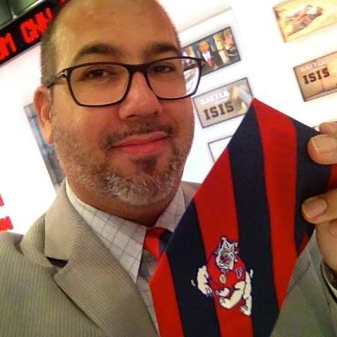 Victor Hernandez shows off his Fresno State Bulldogs tie at CNN.