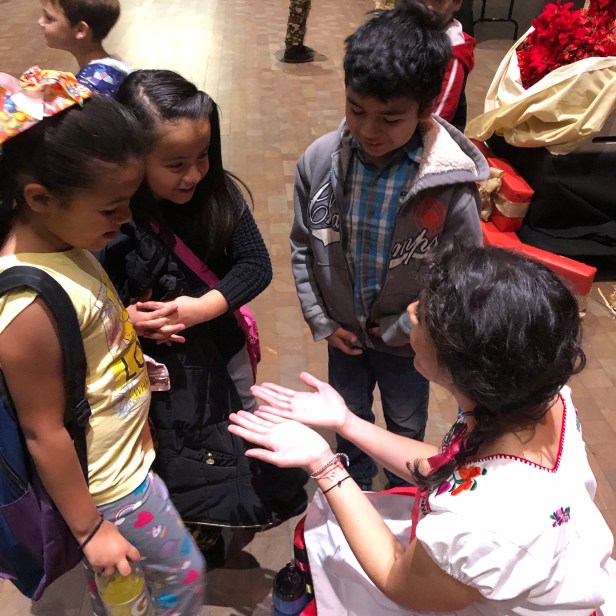 Alejandra Tejeda meets with children after the play
