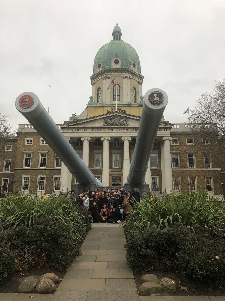 The class poses under the guns outside the Imperial War Museum January 12, 2019.