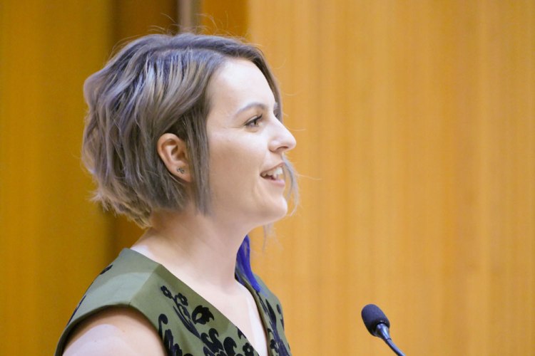 Alyssa Espinola speaks during Arts in Motion.