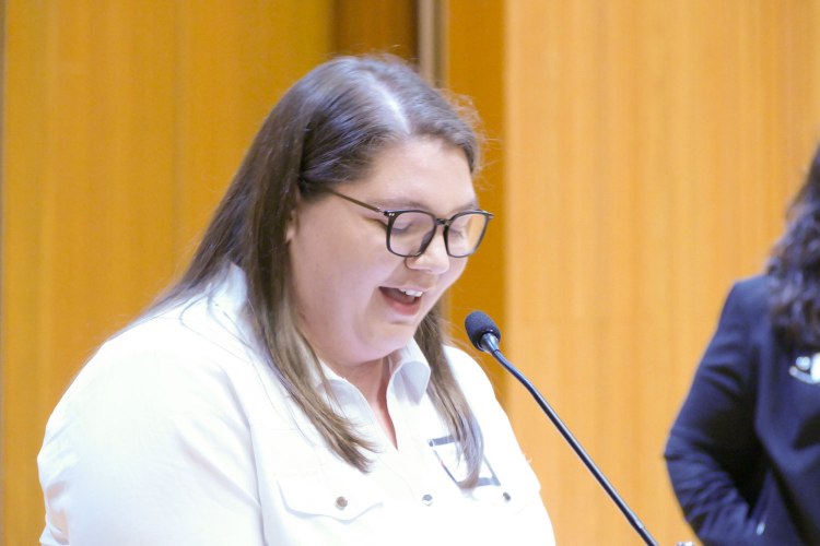 Megan Evans speaks during Arts in Motion.