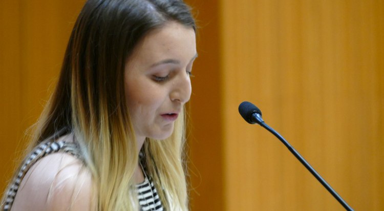 Theresa Lopes speaks during Arts in Motion.