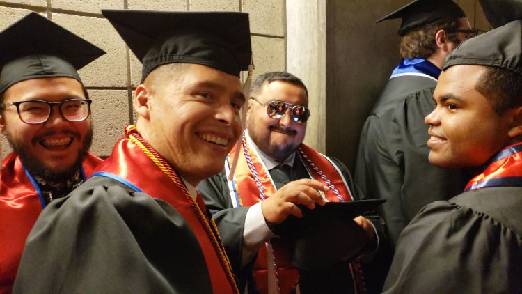 Student of Distinction George Garnica with other MCJ students ahead of CAH Convocation.