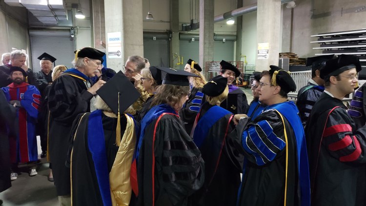 Faculty lines up ahead of CAH Convocation.