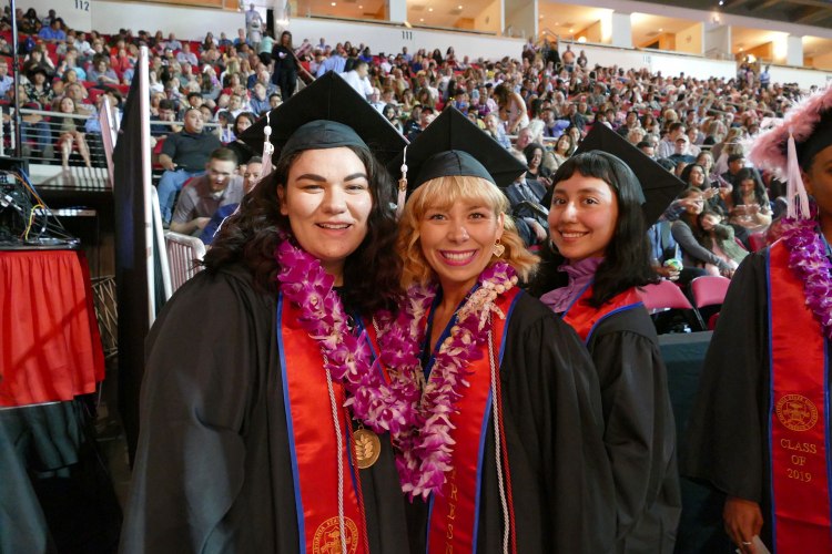Student of Distinction Lia Dewey in line with other Theatre Arts graduates.