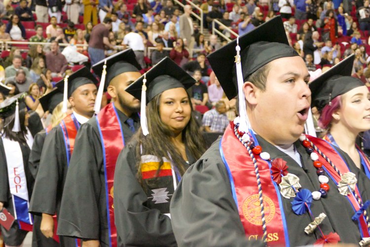 College of Arts and Humanities students enter the Save Mart Center.