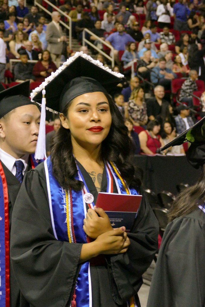 College of Arts and Humanities students enter the Save Mart Center.