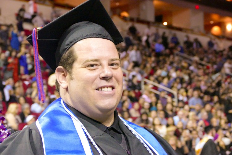 College of Arts and Humanities students enter the Save Mart Center.