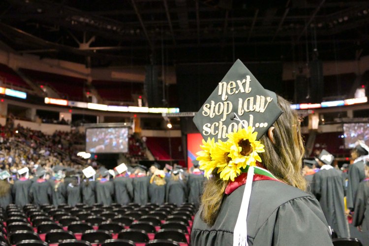 College of Arts and Humanities students enter the Save Mart Center.