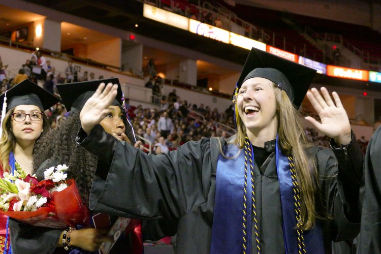 College of Arts and Humanities students enter the Save Mart Center.