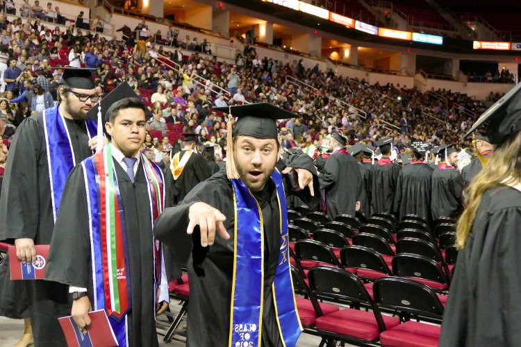 College of Arts and Humanities students enter the Save Mart Center.