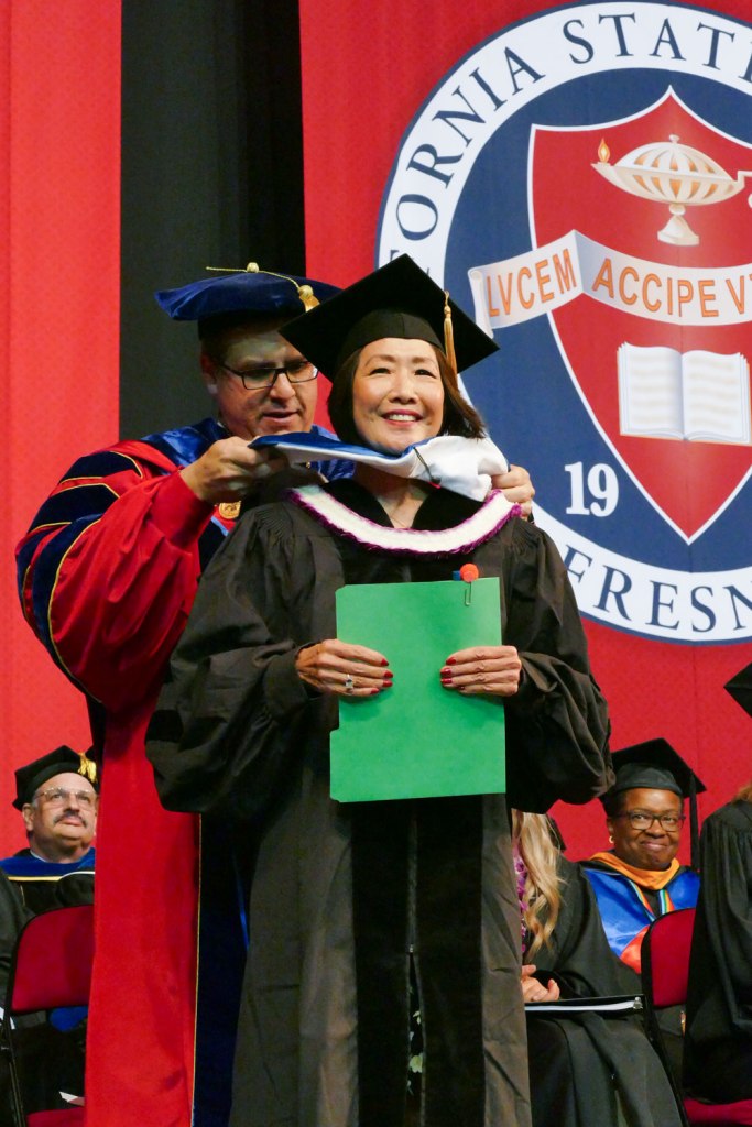 MCJ Alumna Janis Yanehiro receives an Honorary Doctorate of Humane Letters.
