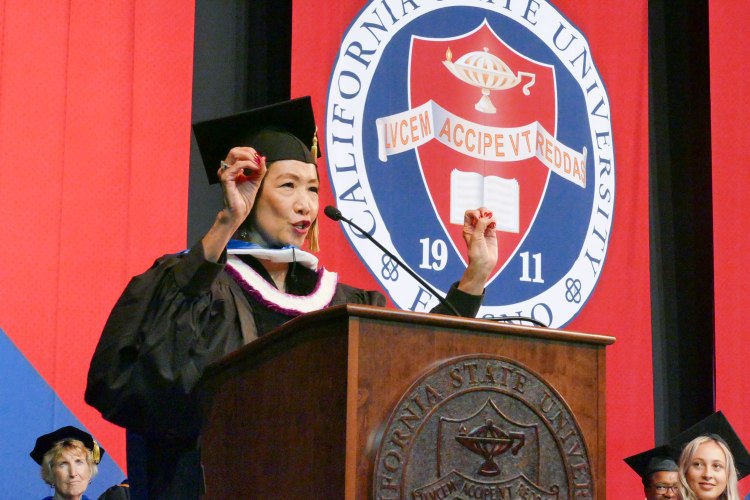 MCJ Alumna Janis Yanehiro speaks after receiving an Honorary Doctorate of Humane Letters.