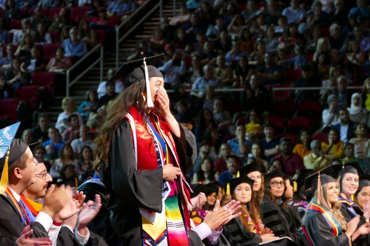 Primavera Leal Martinez reacts after her name is announced as the undergraduate President’s Medalist.