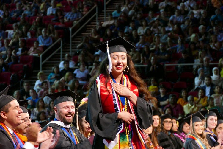 Primavera Leal Martinez reacts after her name is announced as the undergraduate President’s Medalist.