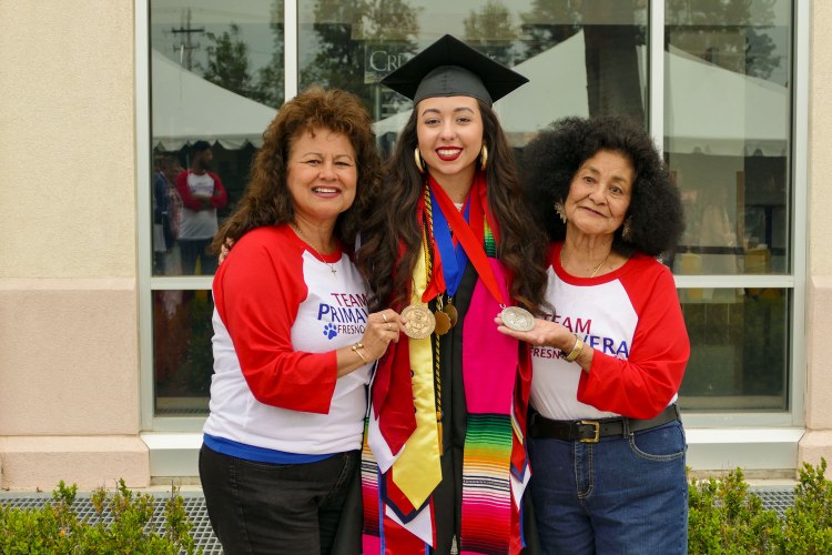 Primavera Leal Martinez celebrates with her family (Team Primavera) following Commencement.