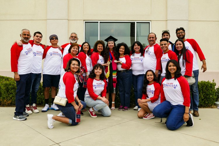 Primavera Leal Martinez celebrates with her family (Team Primavera) following Commencement.