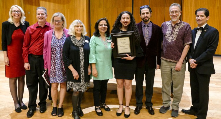 2019 Dean's Medalist Primavera Leal Martinez with College of Arts and Humanities faculty, administrators and board members at the Arts in Motion event.