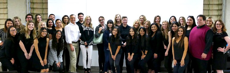 Ersilia with the Professor Betsy Hays' 2019 Public Relations class after they presented their senior project.