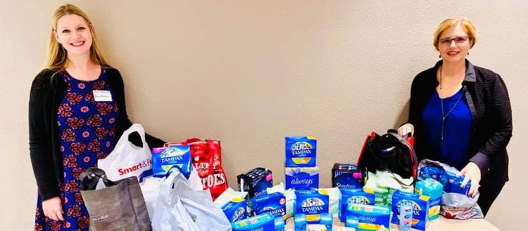 Dr. Falon Kartch and Mary Castro volunteer at Better Period’s event downtown for National Period Day, Oct. 19.