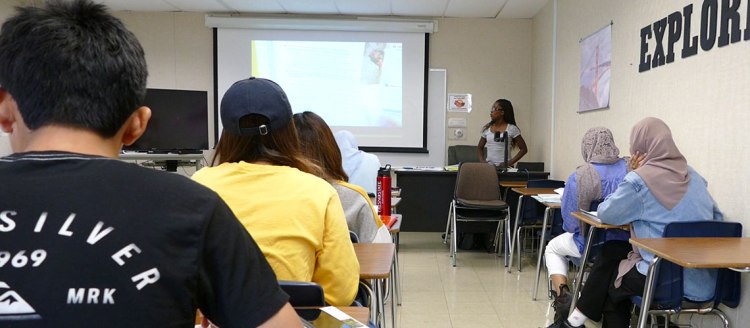 Act Like a Teacher - Former Linguistics 171 student, Jeanette Yeboah-Amoako, teaches a class in her new job at the American English Institute.