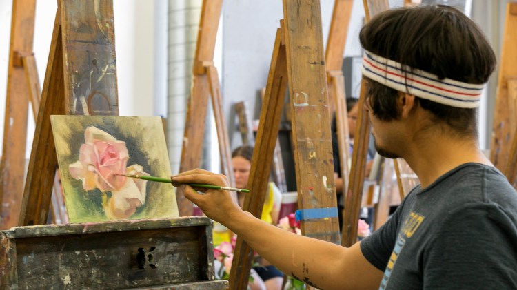 Student paints in 2019 CSU Summer Arts Alla Prima Class