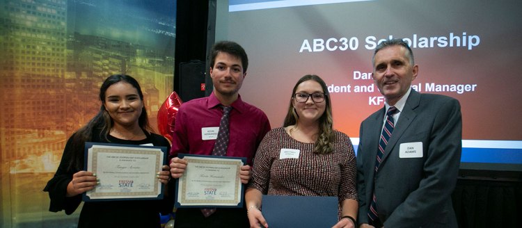 Recipients of the ABC30 Scholarship Tanya Acosta, Kevin Hernandez, and Brittney Steele with ABC30 President and General Manager Dan Adams.