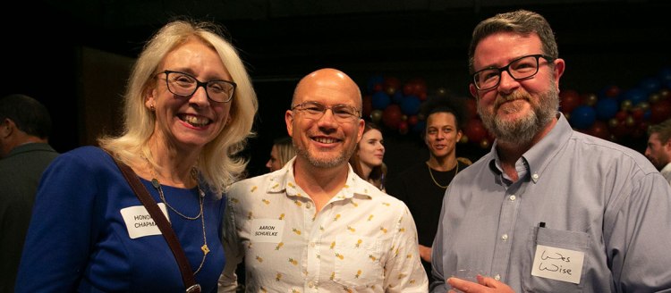 College of Arts and Humanities interim Dean Honora Chapman with  MCJ faculty Aaron Schuelke and Wes Wise.