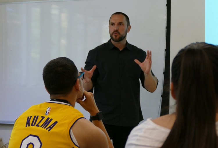 Dr. Vadim Keyser engages his students in the classroom.