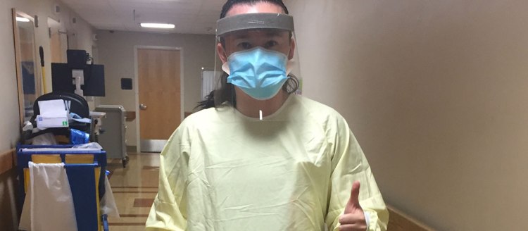 Carolyn Bentley PT, DPT in full PPE (personal protective equipment).
