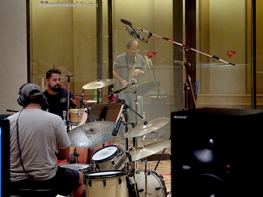 Nathan Guzman (drums), Richard Juarez (percussion) and Benjamin Boone (Sax)