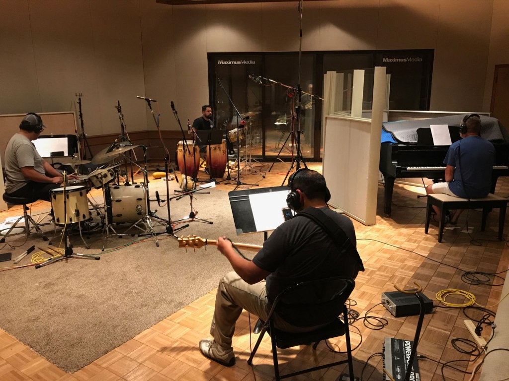 Nathan Guzman (drums), Richard Juarez (percussion), Patrick Olvera (bass) and Craig VonBerg (piano).