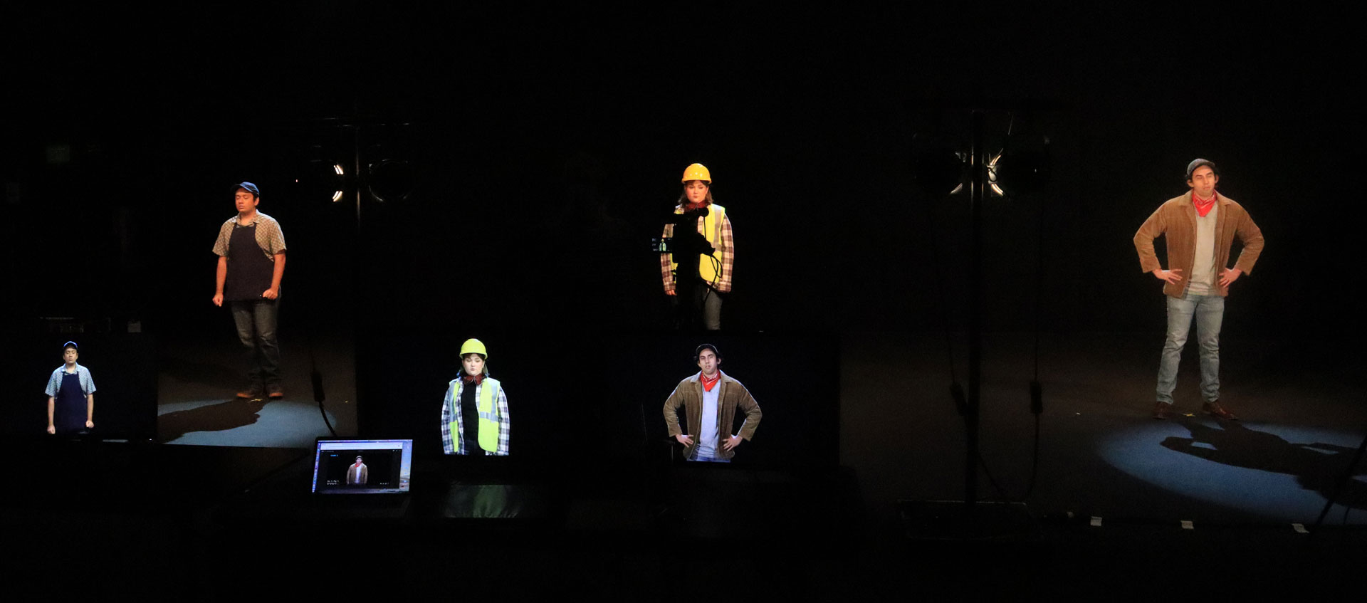 "Witness" Teya Juarez, "Witness" Krishan Joshi, and "Witness" Andrew Trevino are reflected in video monitors.