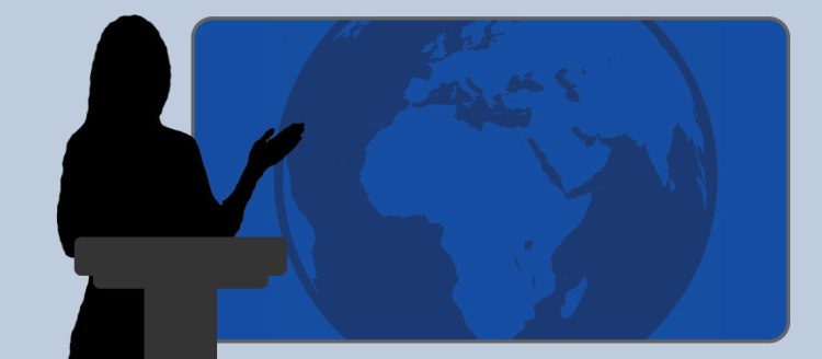 silhouette of a woman at a podium