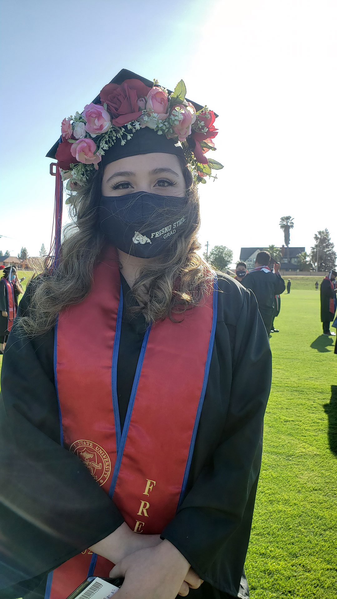 Grad hat decorated with flowers.