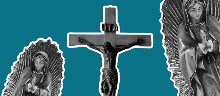 two Madonna statues and a crucifix.