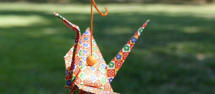 Origami hangs from one of the Hiroshima trees.