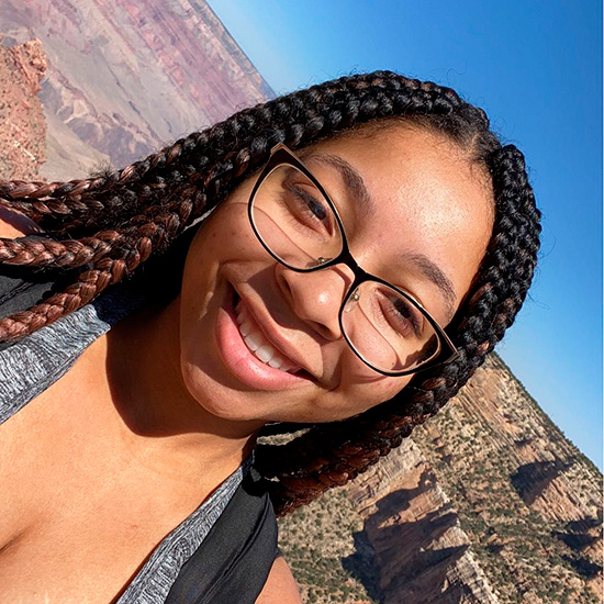 Alexis Richard at the Grand Canyon, with photo tilted 45 degrees sideways.