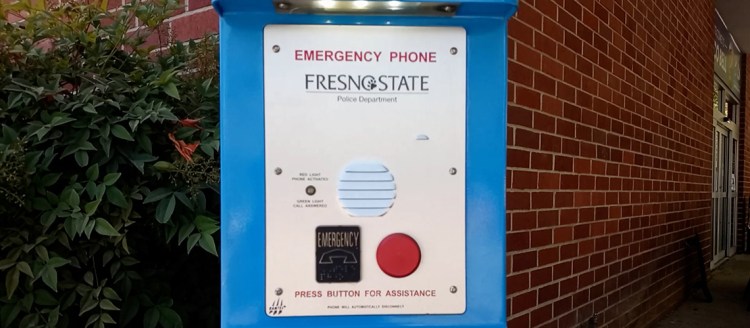 Emergency photo at Fresno State in front of a brick building.