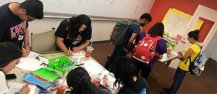Fresno State Students Participating in Zine Making Workshop Fall 2019. Photo by Anthony Cody