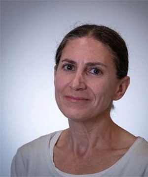 Headshot of Meredith Cohn in a white shirt