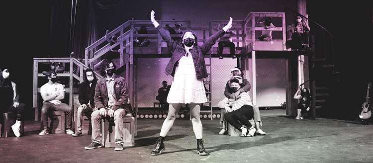 Students rehearse for "Rent" in the University Theatre.