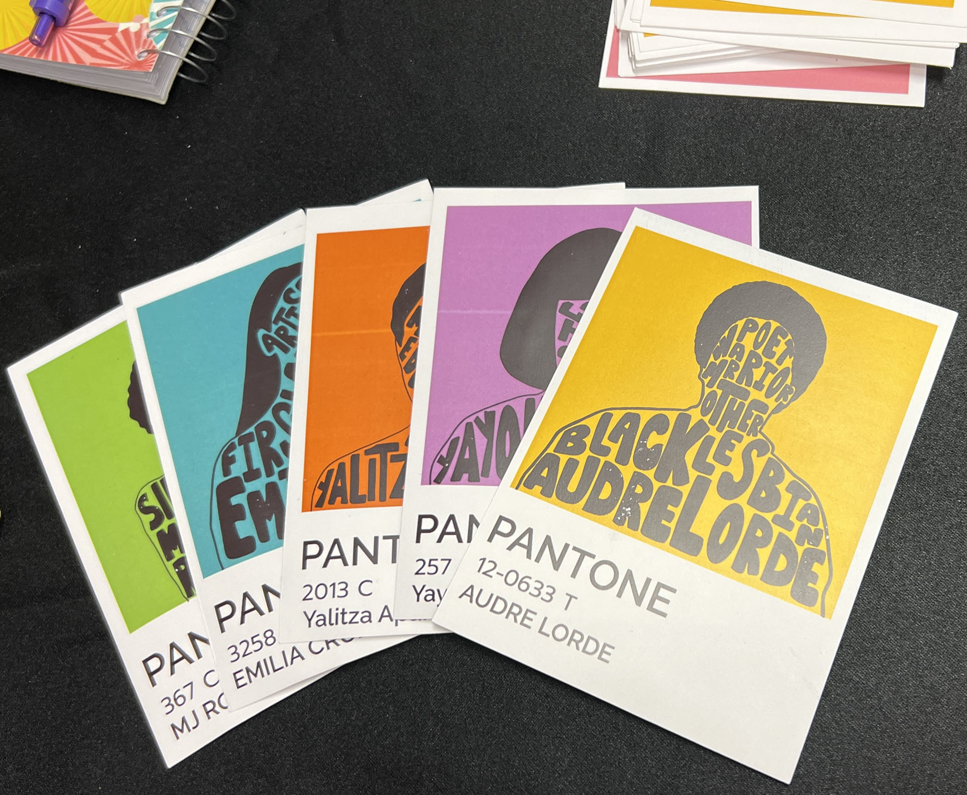 Pantone Cards depict victims shot by police.