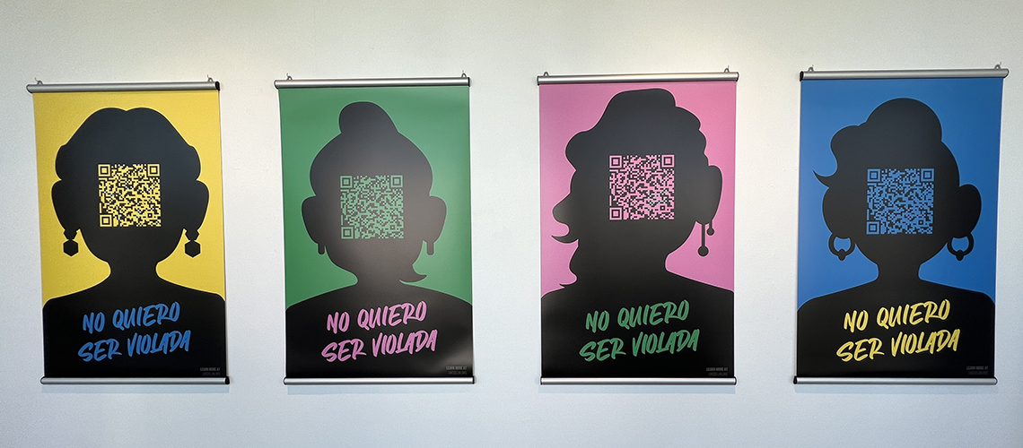 No Quiero Ser Violada posters show silhouette with of women with QR codes.