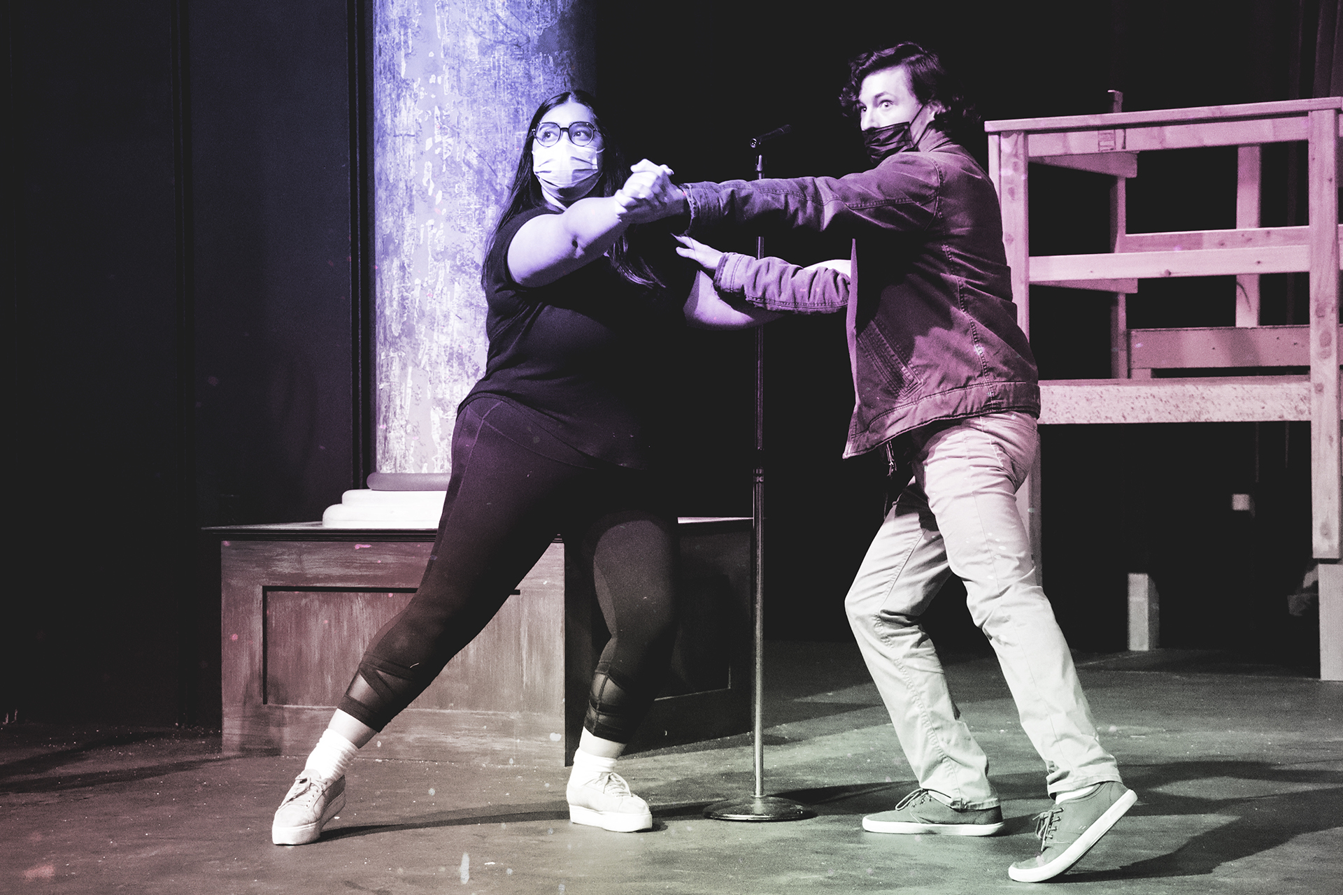 Students rehearse for "Rent" in the University Theatre.