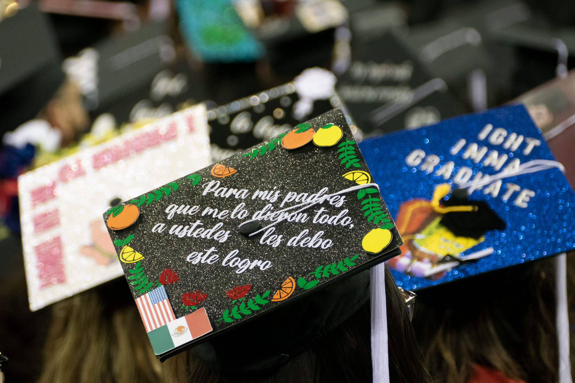 Several decorated grad hats.