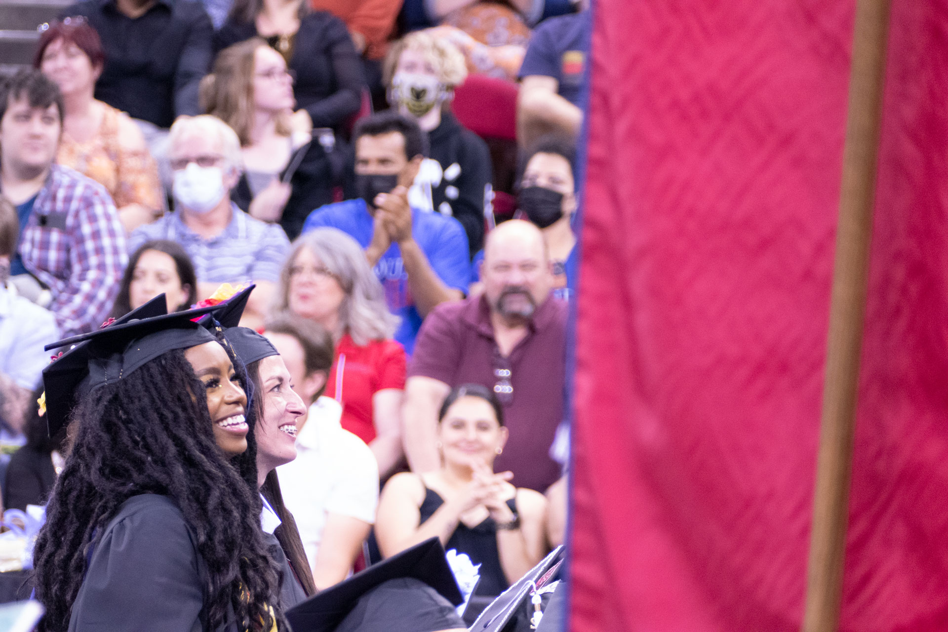 Graduate President's Medalist Audia Dixon stands.